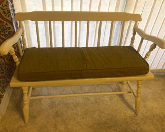 Wood country bench with cushion.