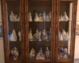 Large collection of Royal Doulton figurines.