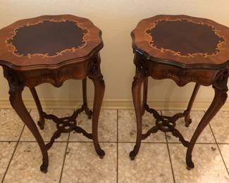 Pair of carved wood side tables with beautiful detailed inlay.