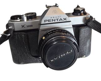 Nikon Fuji Kodak Chinon Cameras.
Bell & Howell Filmo Camera Nikon F Book
Vintage Tundra Ultima 666 Camera Tripod
Pentax K1000 SF1N SLR Argus Cameras Lens
Canon G2 Camera, Photo Printer Etc
Sony Discman, Panasonic Cassette Tape Player
Vintage Polaroid SX-70 Sonar Land Camera
