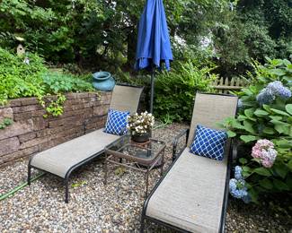 2 lounge chairs, umbrella