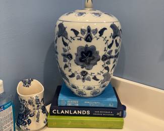 table books, blue and white ginger jar