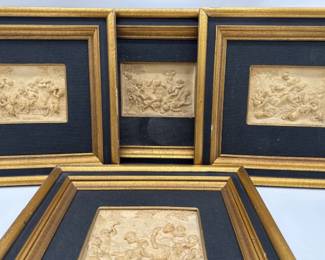 Grouping of 4 matted and framed lava stone carvings