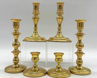 Three pairs of Baldwin brass candlesticks