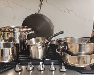 LADIES IF YOU'RE IN THE MARKET FOR COOKWARE, WE HAVE IT! WOLFGANG PUCK, TOOLS OF THE TRADE, JAMIE OLIVER, CALPHALON & MORE.