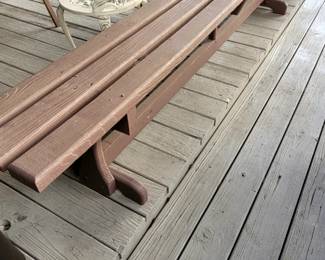 WE HAVE TWO OF THESE LONG OUTDOOR BENCHES
