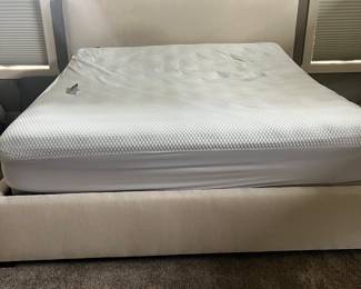 King upholstered bed frame and headboard.  King motion mattress 
