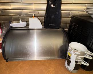 Can opener, measuring cups, more