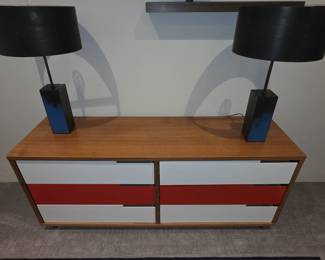 A Blue Dot "Modulicious" low chest with a pair of Keven Busta lamps