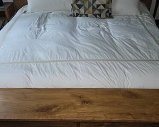 A Crate and Barrel King bed with Bookcase