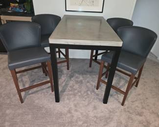 A Crate and Barrel Table and Chairs
