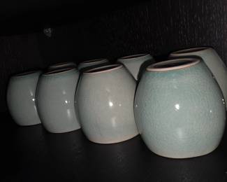 A group of celadon tea bowls