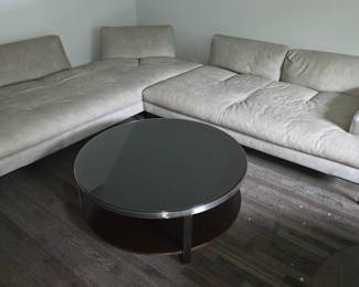 A Gamma leather sectional sofa with a Hickory Business Furniture two tier cocktail table