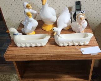 1970's collection of ducks/geese on rolling microwave cart