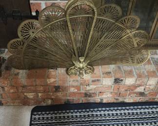 Brass peacock fireplace fan