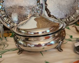 Chrome platters and silver plate with Pyrex casserole dish