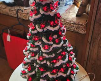 Close up of Christmas tree decorated with red birds