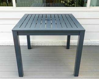 Pottery Barn Outdoor Patio Set: Sofa, End Table, Coffee Table, Rocker, Square Umbrella Table.
Rocker has paint peeling on bottom rockers.