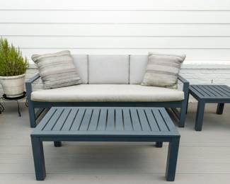 Pottery Barn Outdoor Patio Set: Sofa, End Table, Coffee Table, Rocker, Square Umbrella Table.
Rocker has paint peeling on bottom rockers.