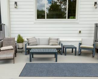 Pottery Barn Outdoor Patio Set: Sofa, End Table, Coffee Table, Rocker, Square Umbrella Table.
Rocker has paint peeling on bottom rockers.