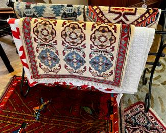 Selection of hand, woven area, rugs, large, medium, and small