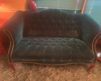 Emerald green velvet love seat