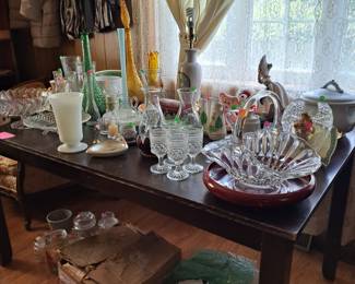 Multiple glass ware, ranging from antique to vintage items.