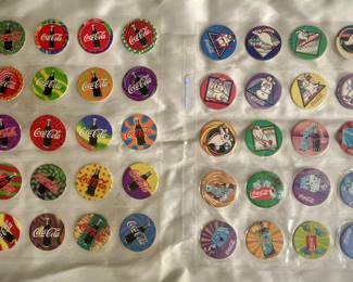 Vintage Coca-Cola Pogs, also known as "Coke Caps" or "Milkcaps," from the 1990s. 