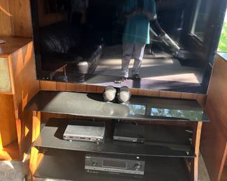 Sony flat-screen television & Orbs Surround Sound Speakers