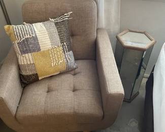 Occasional chair, decorative pillow, mirrored stand