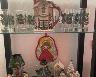 2nd shelf: Holly Tumbler Glasses, Fitz & Floyd Pitcher. 3rd shelf: Fitz & Floyd Holiday Wishes plate, assorted candle holders