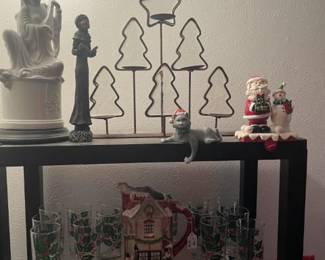 Top Shelf Christmas decor. Christmas tree candle holder, Oriental Lamp, Stocking holders, Carroller