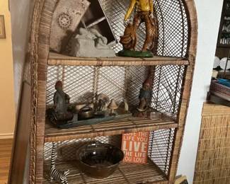 Wicker display shelf with interesting collectibles