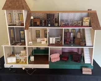 "Inside" Doll House. Furniture pieces sold separately.