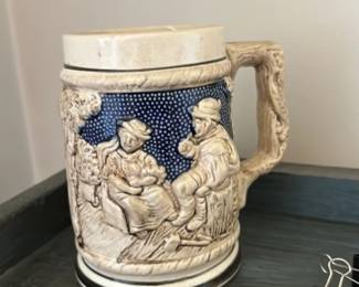 German Beer Stein with Relief Decoration