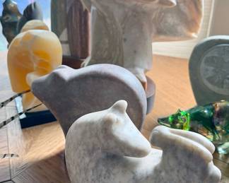 Multiple carved bears of natural materials
