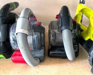 Hand-held vacuums