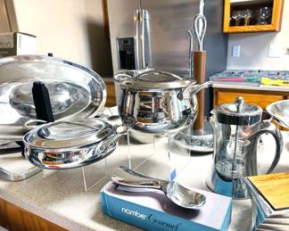 Nambe decor, including wooden salad bowl + servers, trivets, ladle, cookware + French press; many items new in box