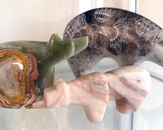 Multiple carved bears of natural materials
