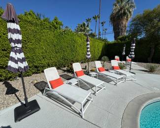 6 - White Nardi Chaise Longes. 4 - Patio Umbrellas & Stands. 4 - Small Nardi Pop Bianco Resin Side Table with Tray