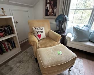 Drexel Heritage chair and ottoman on brass casters