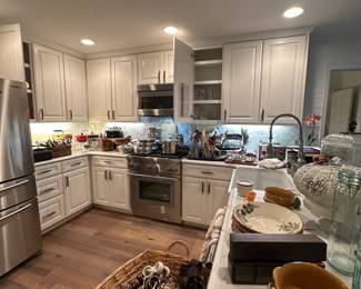 Full kitchen with All Clad, Le Creuset, Apilco, Williams Sonoma, Sur La table, wolf, and more