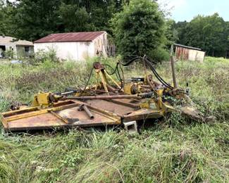 Bat wing mower