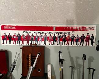 Microphones, NASCAR Winston cup poster, music stands 
