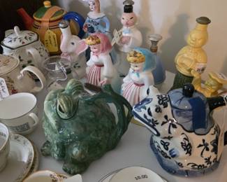Antique sprinklers, tea pots