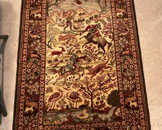 ORIENTAL RUG WITH WARRIOR SCENE