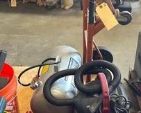 1902  Jack Stands, Floor Jack, Portable Air Tank, Dolly, and WetDry... 