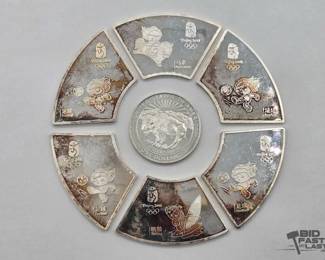 1250  7 Silver Coins, 232.8g 