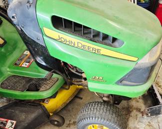 Much tools and outdoor items. John Deere "135 Automatic" riding mower