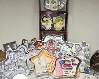 Much, much kitchenware. Wilton cake pans